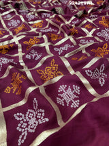 A wine saree with white patterns withCotton silk Bandhani Gotapatti Work Saree