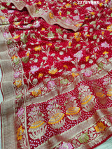 A red and gold Georgette saree with Meenakari weaving pattern 