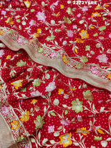 A red and gold Georgette saree with Meenakari weaving pattern 