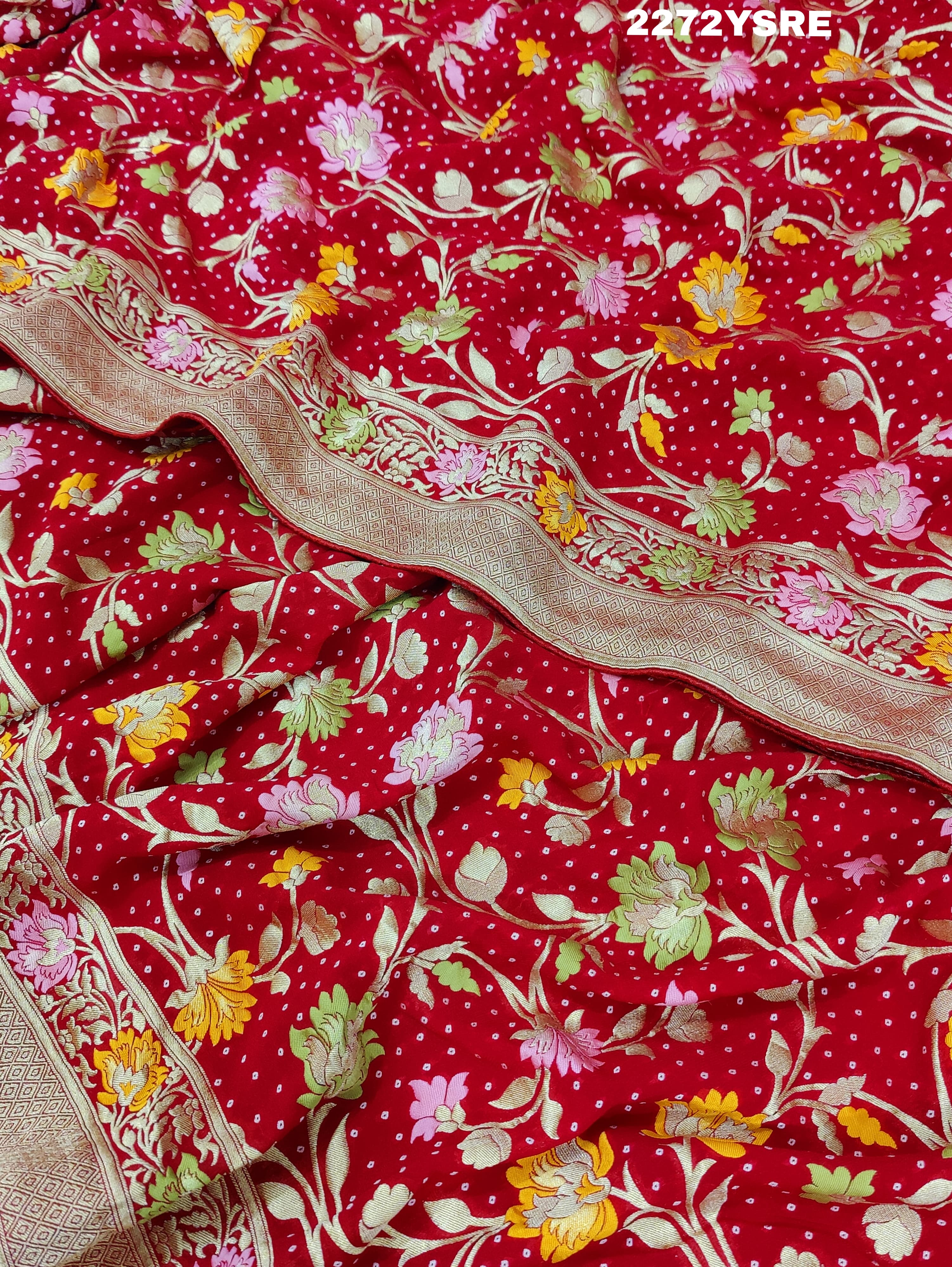 A red and gold Georgette saree with Meenakari weaving pattern 