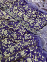 A purple Banarasi style saree with sequence embroidery work 
