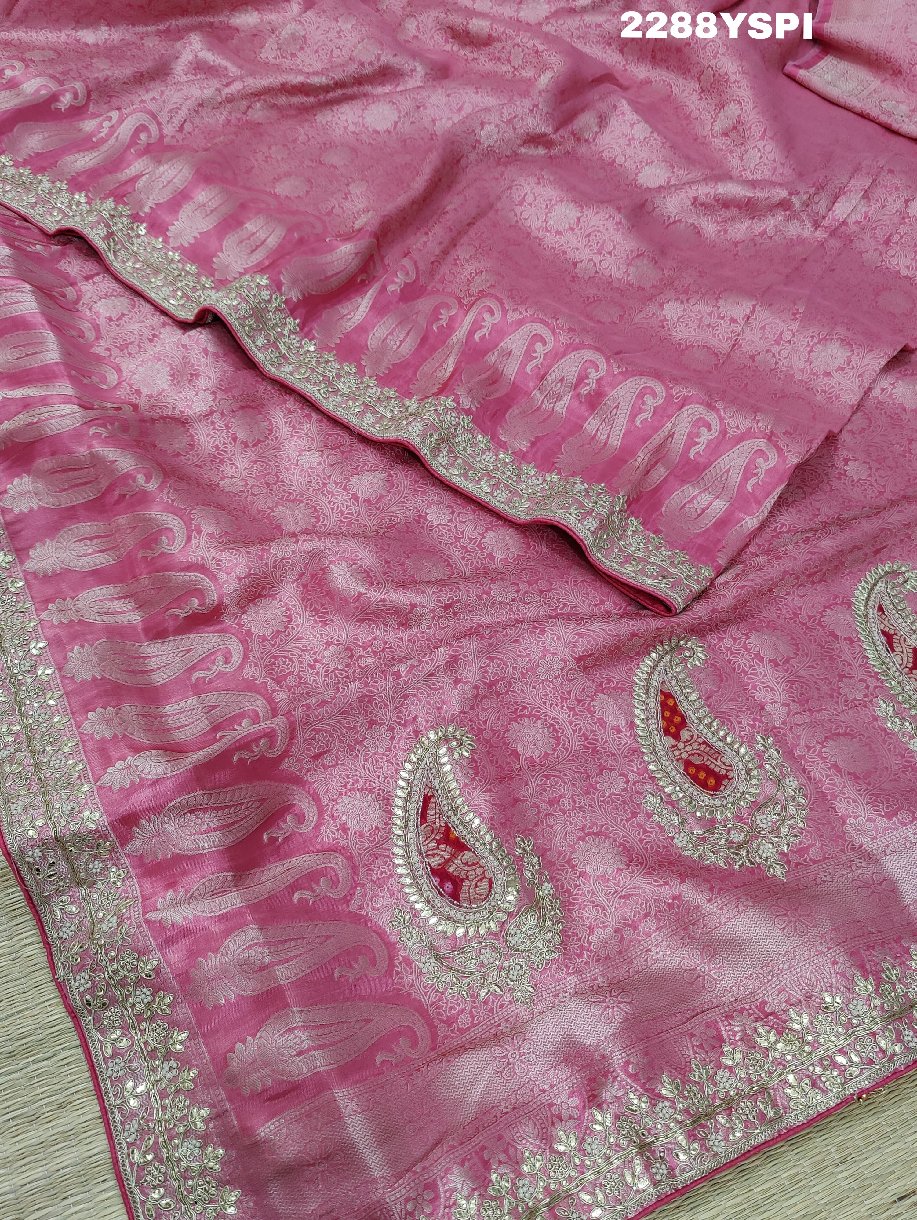 A pink Banarsi silk Bollywood style saree with sequence and gotapatti work