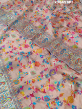A pink and yellow cotton silk saree with Kashmiri style patterns and Meenakari weaving work.