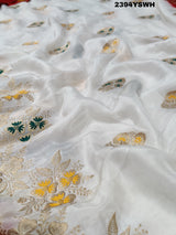 A Banarasi style saree with zari weaving, showcasing both the intricate detailing and the fabric's texture.