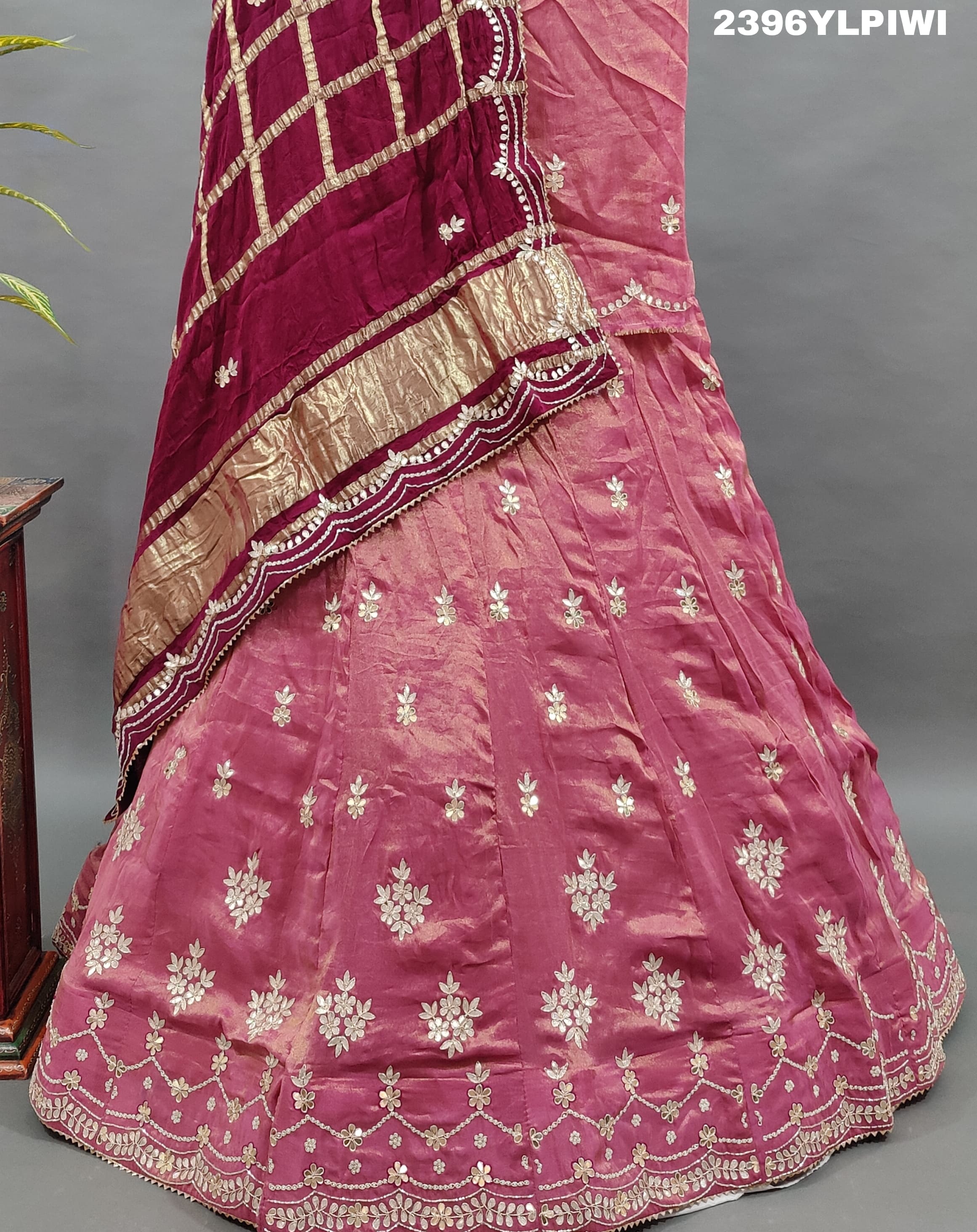 A pink Lehenga with gota patti work 