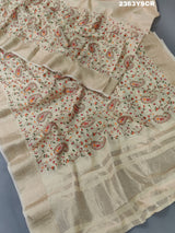 A cream-colored Kota Doriya saree with floral pattern