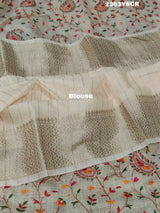 A cream-colored Kota Doriya saree with floral pattern