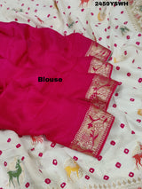 A Chinon silk saree with a Kalamkari style pattern, featuring a white base with multicolored floral designs and zari weaving details