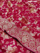 A Banarasi style saree with cutdana work, predominantly pink with gold geometric patterns