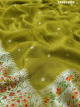 A green Banarasi silk saree with zari weaving and floral embellishments, 