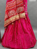 A pure gaji silk lehenga in pink with heavy gota patti work
