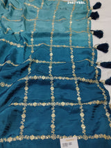 A blue saree with geometric pitton work