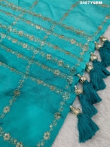 A sea green color saree with geometric pattern and pittan work