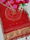 A red Gaji silk saree with Bandhani style embellishments and Gotapatti work