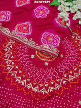 A pink Gaji silk saree with Bandhani style embellishments and Gotapatti work