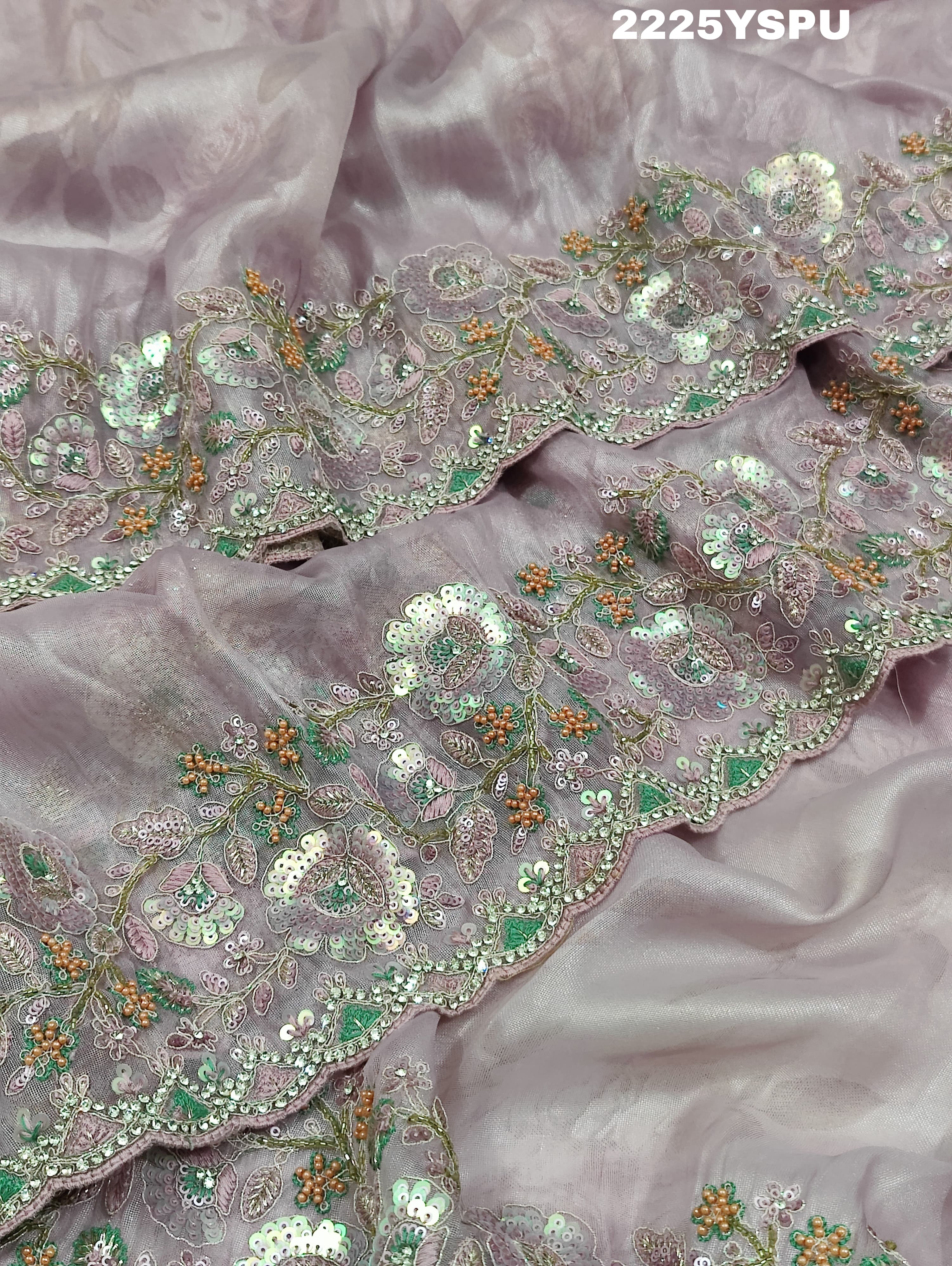 A purple tissue silk Bollywood style saree with sequence embroidery work 
