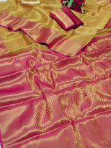 A Banarasi style tissue silk saree with zari border work yellow and pink color