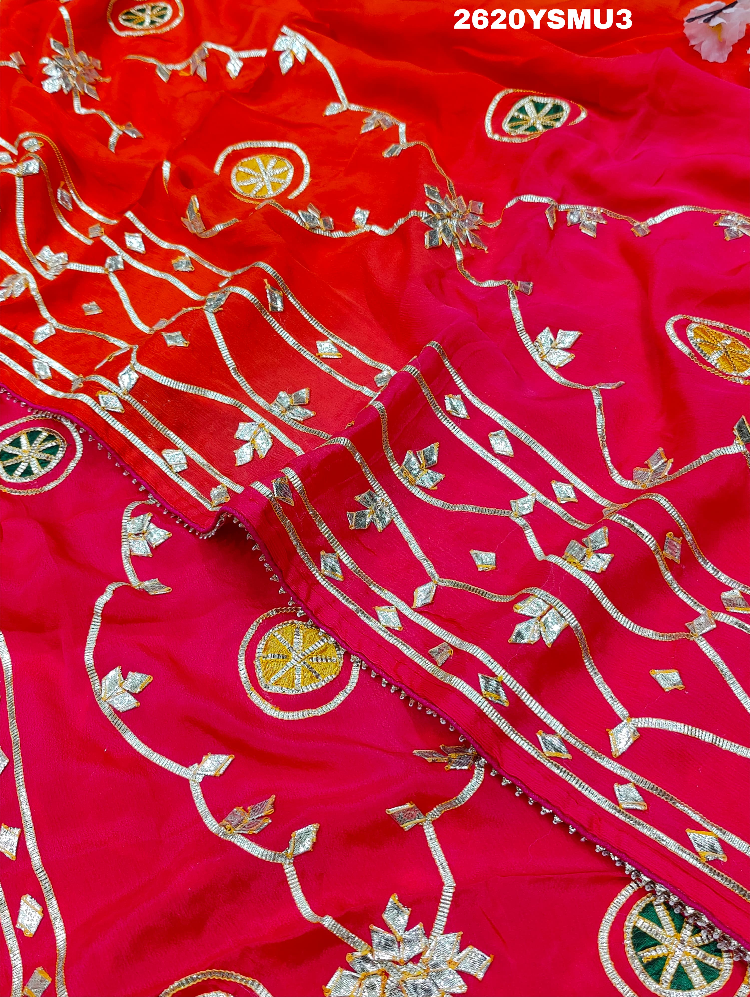 Red and orange saree with white floral patternsBollywood Style with Gotapatti Work 