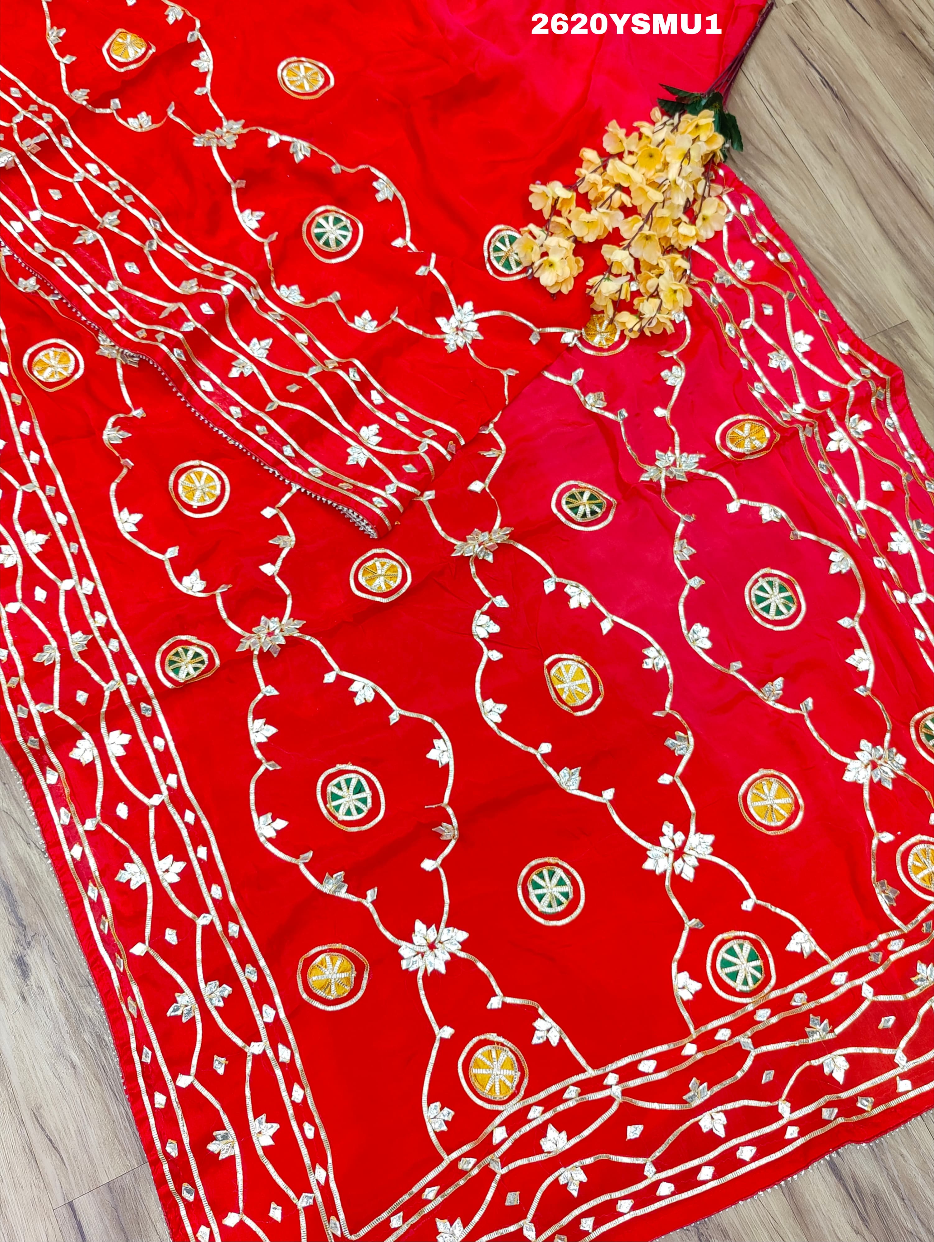 Red saree with white and gold floral patternsBollywood Style with Gotapatti Work