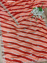 By Leheriya SareeWith Traditional Wear
