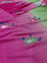 Saree with floral patterns on a pink and green Crush Tissue Printed Style With Casual wear