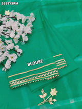 Teal sareewith Silverpatterns Organza Leheriya Style With Gotapatti Work 