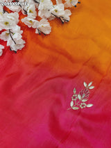 A orange and pink colour saree with floral zardozi work and Banarasi style 