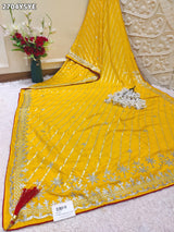 By Yellow saree with silver embroiderySilk Leheriya Style for festive 