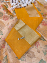 Yellow and beige saree with intricate patternsCotton Silk Printed With Zari border .