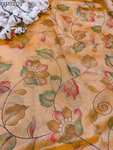 Yellow and beige saree with intricate patternsCotton Silk Printed With Zari border .