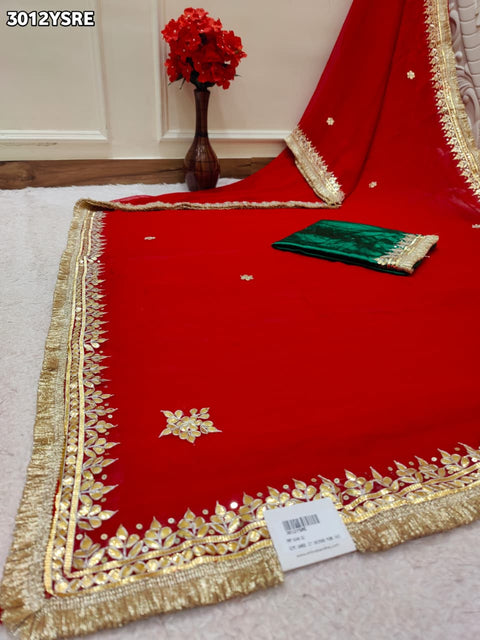 Red saree with gold border with chiffon fabric and gotapati work