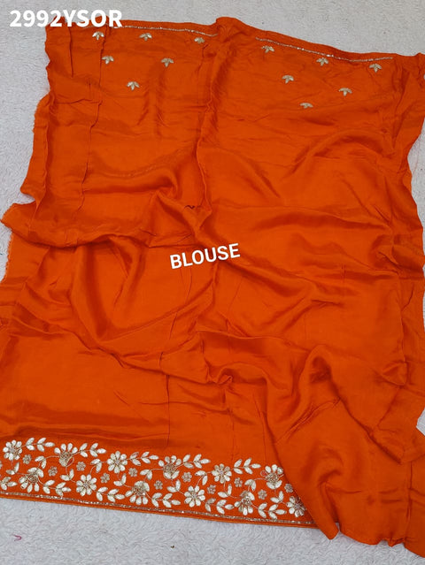 Orange saree with gotapati embroidery for weddings 