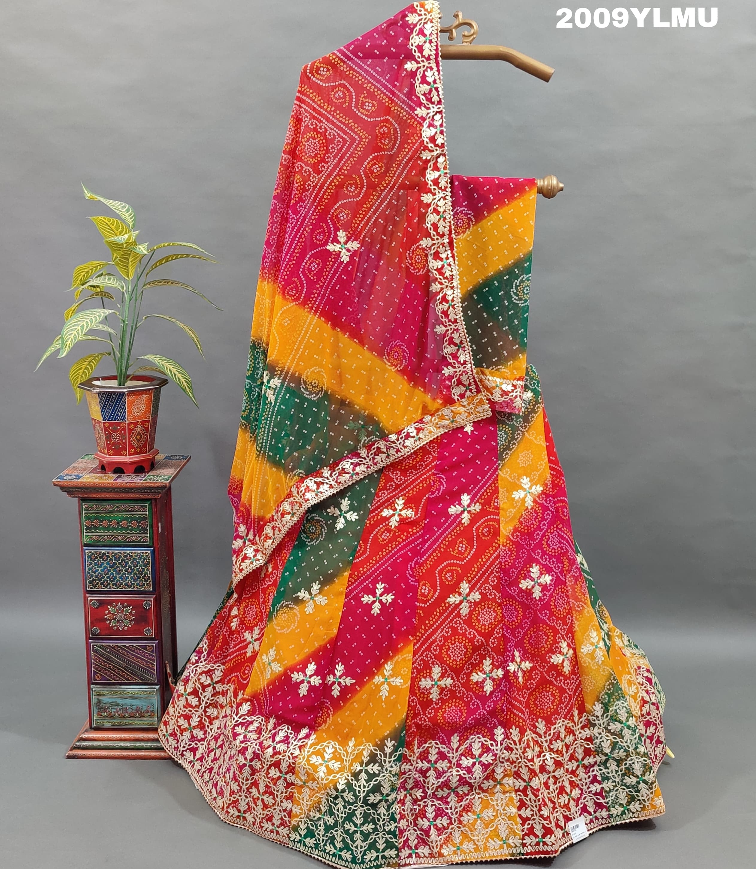 A multicolored pure georgette lehenga set with floral and a gotapatti