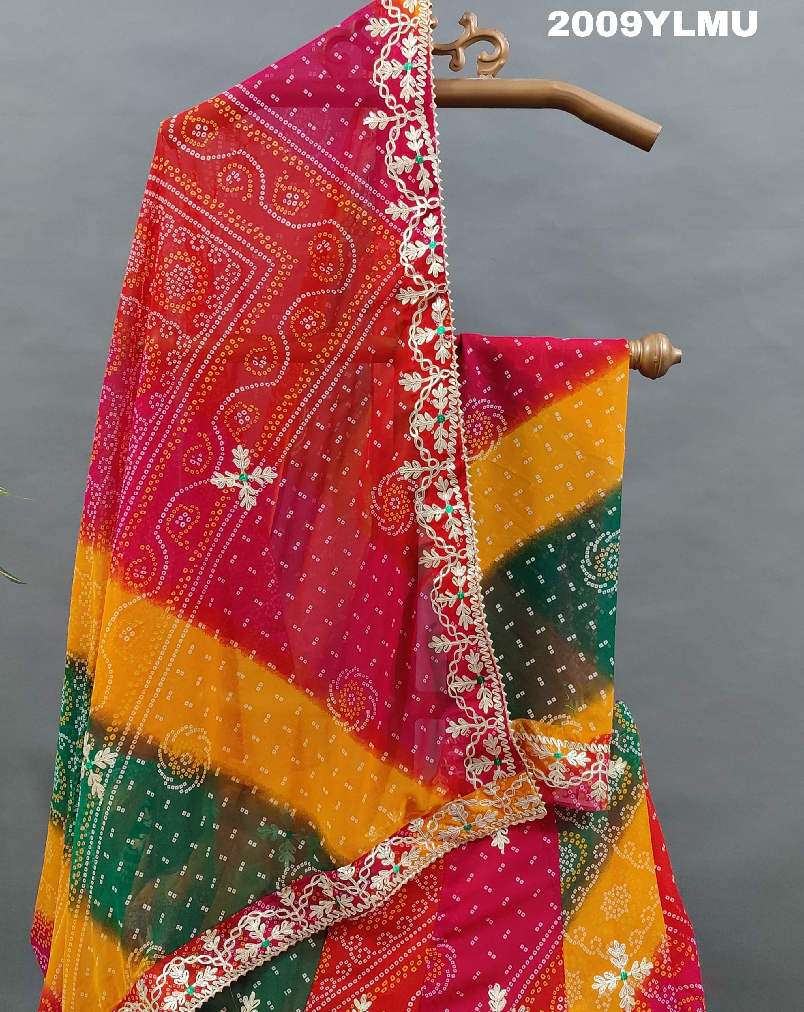 A multicolored pure georgette lehenga set with floral and a gotapatti