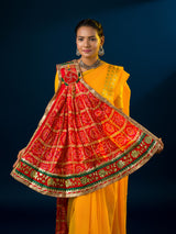 Atraditional Rajasthani Marwadi chunri pila with red and yellow colors, featuring heavy embellishments and a yellow border.
