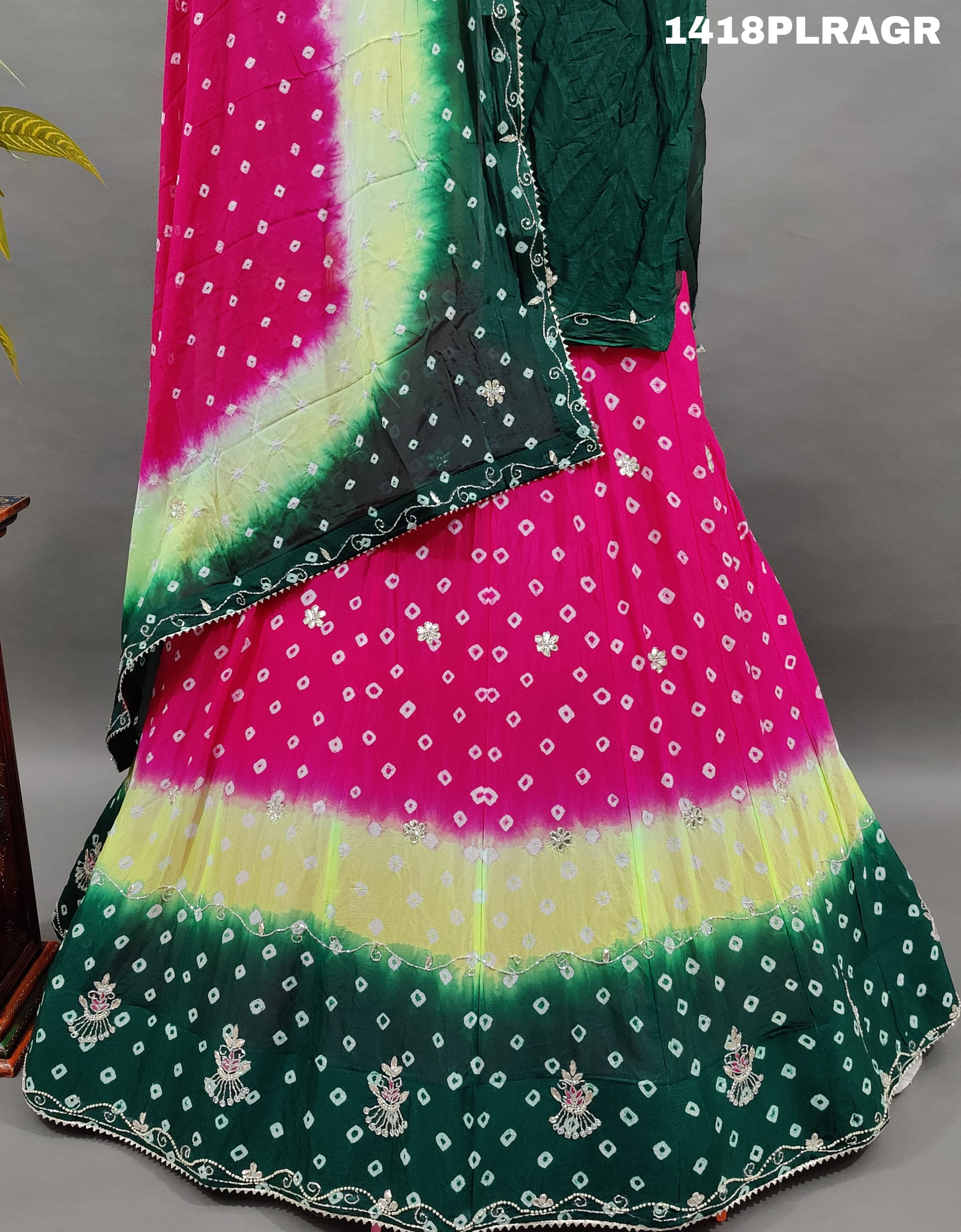 A traditional Indian lehenga with multicolor bandhani 
