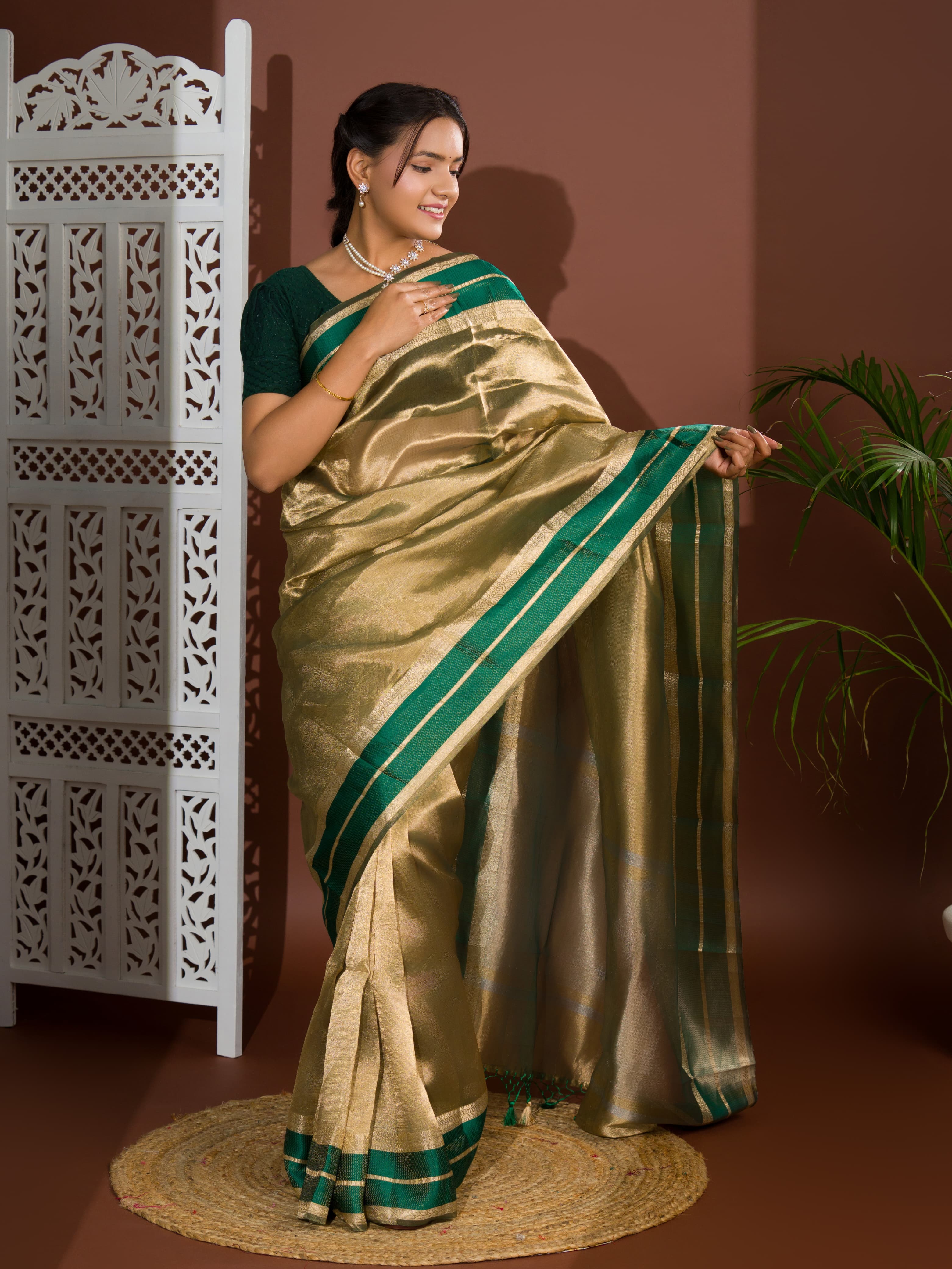 Agreen and gold tissue Banarasi handloom saree