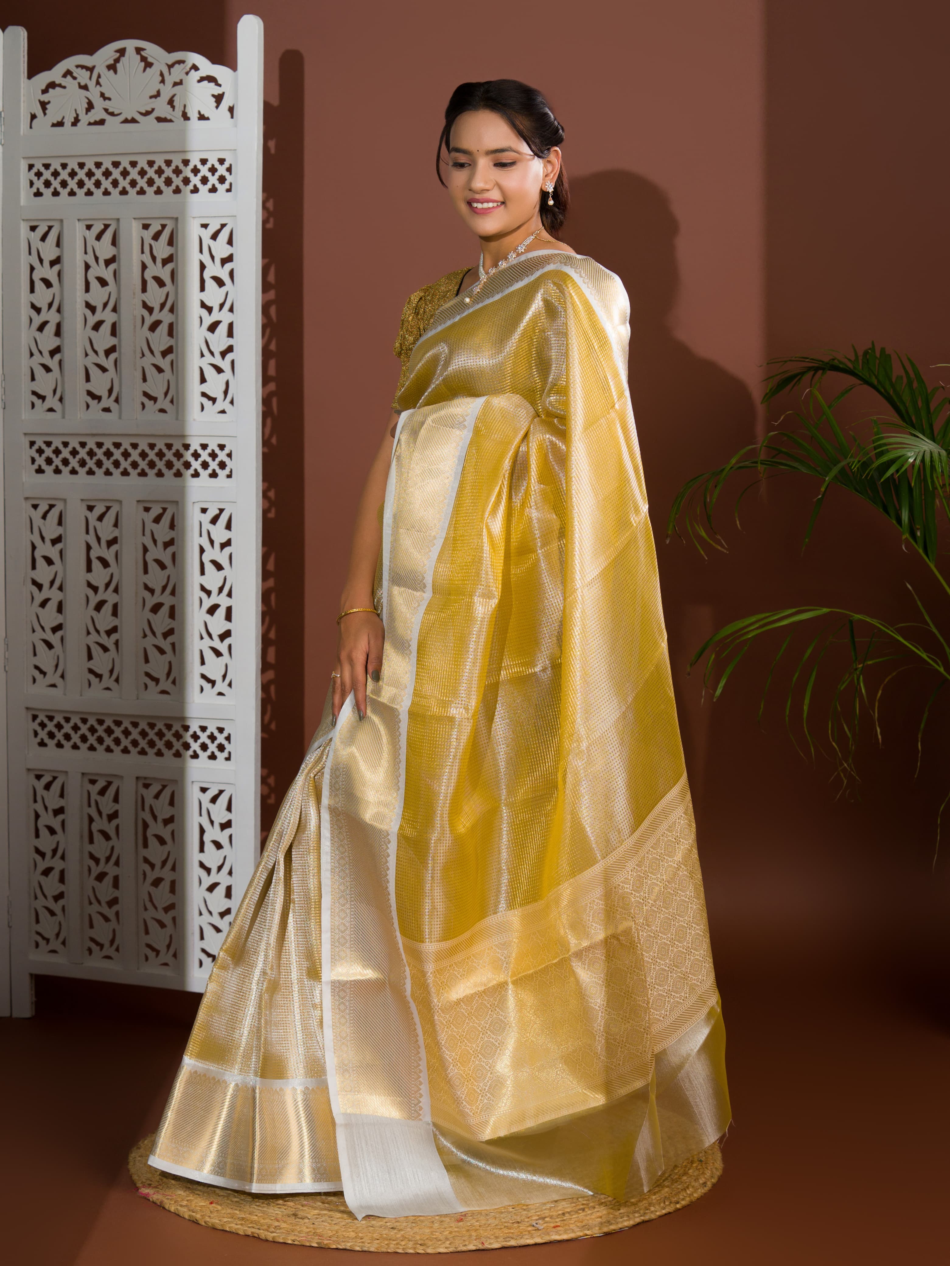 tissue silk Banarasi saree with zari weaving, in orange and yellow colors