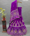 A purple Gajji silk lehenga with white bead work