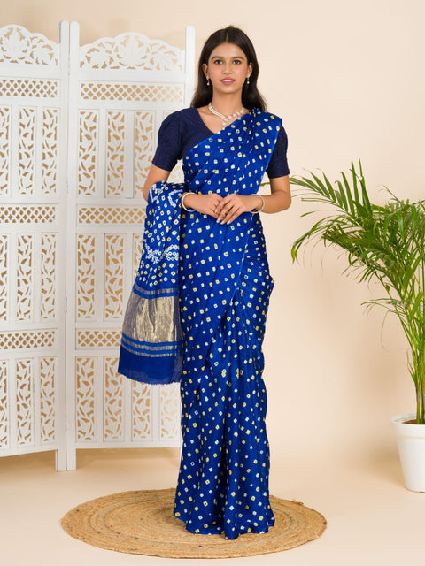  A blue saree with bandhani print and lagdi patola pallu 