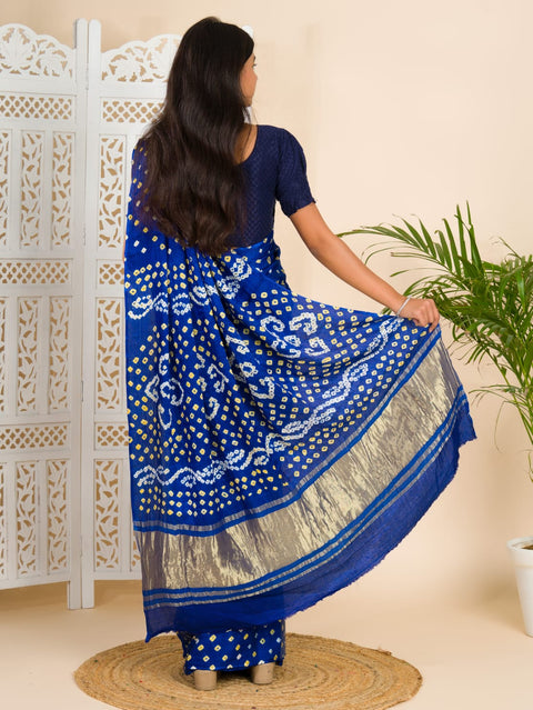  A blue saree with bandhani print and lagdi patola pallu 
