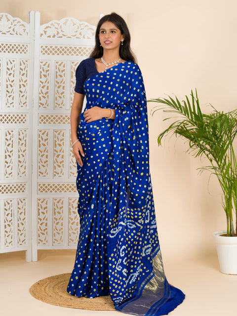  A blue saree with bandhani print and lagdi patola pallu 