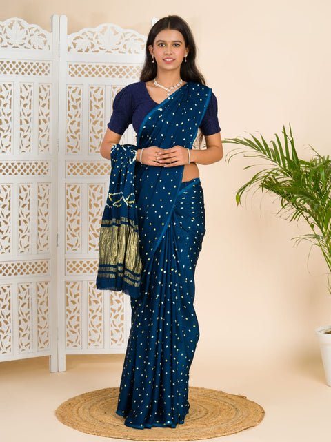 A blue saree with bandhani print and a lagdi patla pallu, 