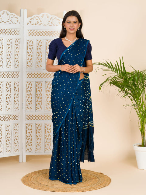 A blue saree with bandhani print and a lagdi patla pallu, 