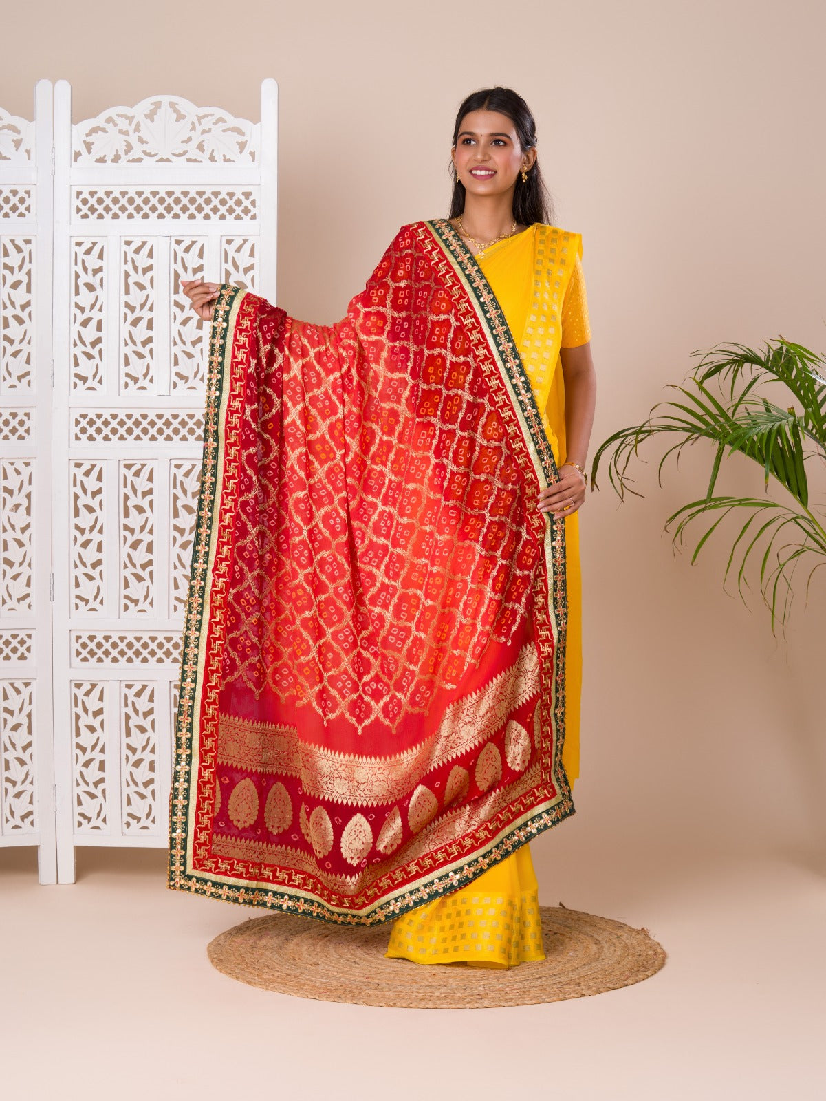 Ared and orange Banarasi Ojaria Chunri Piliya dupatta with a traditional floral pattern