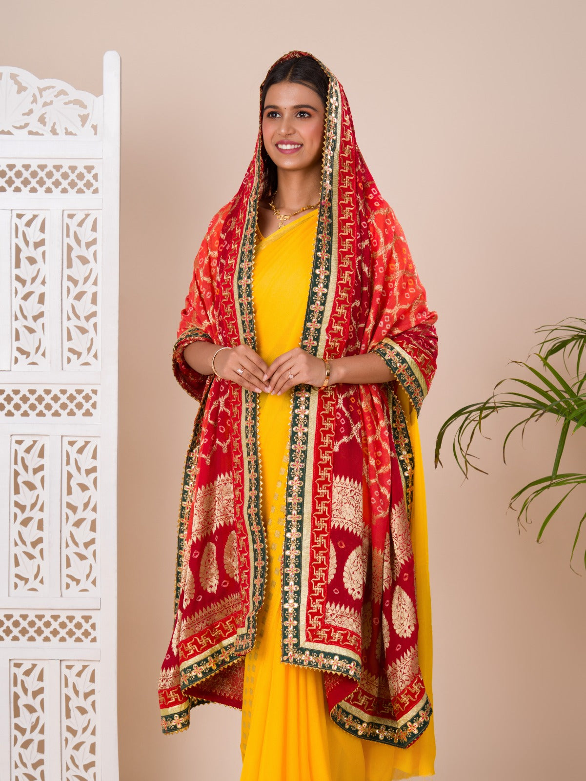 Ared and orange Banarasi Ojaria Chunri Piliya dupatta with a traditional floral pattern
