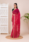 Ared and pink bandhani style saree with gotapatti embellishments and a mangal patha design