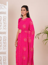 A pink saree with bandhani pattern and aari tari work