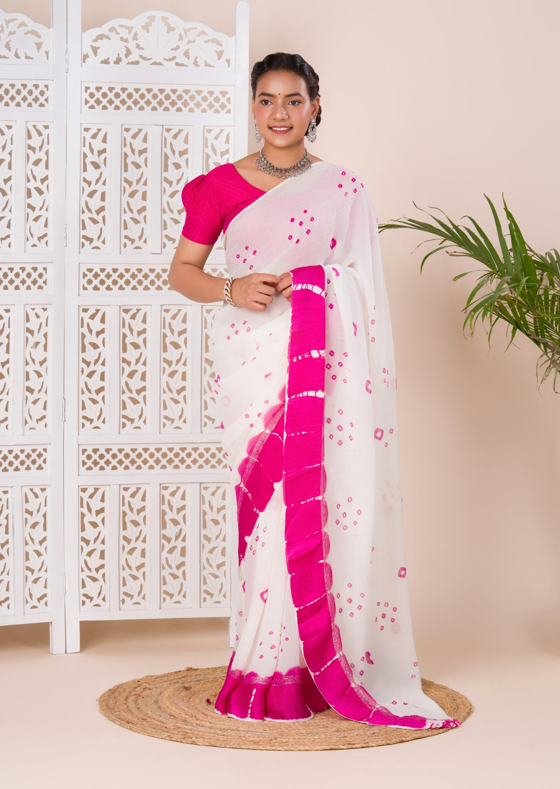 Georgette Gulti Bandhej Satin Patta Border Saree in white colour