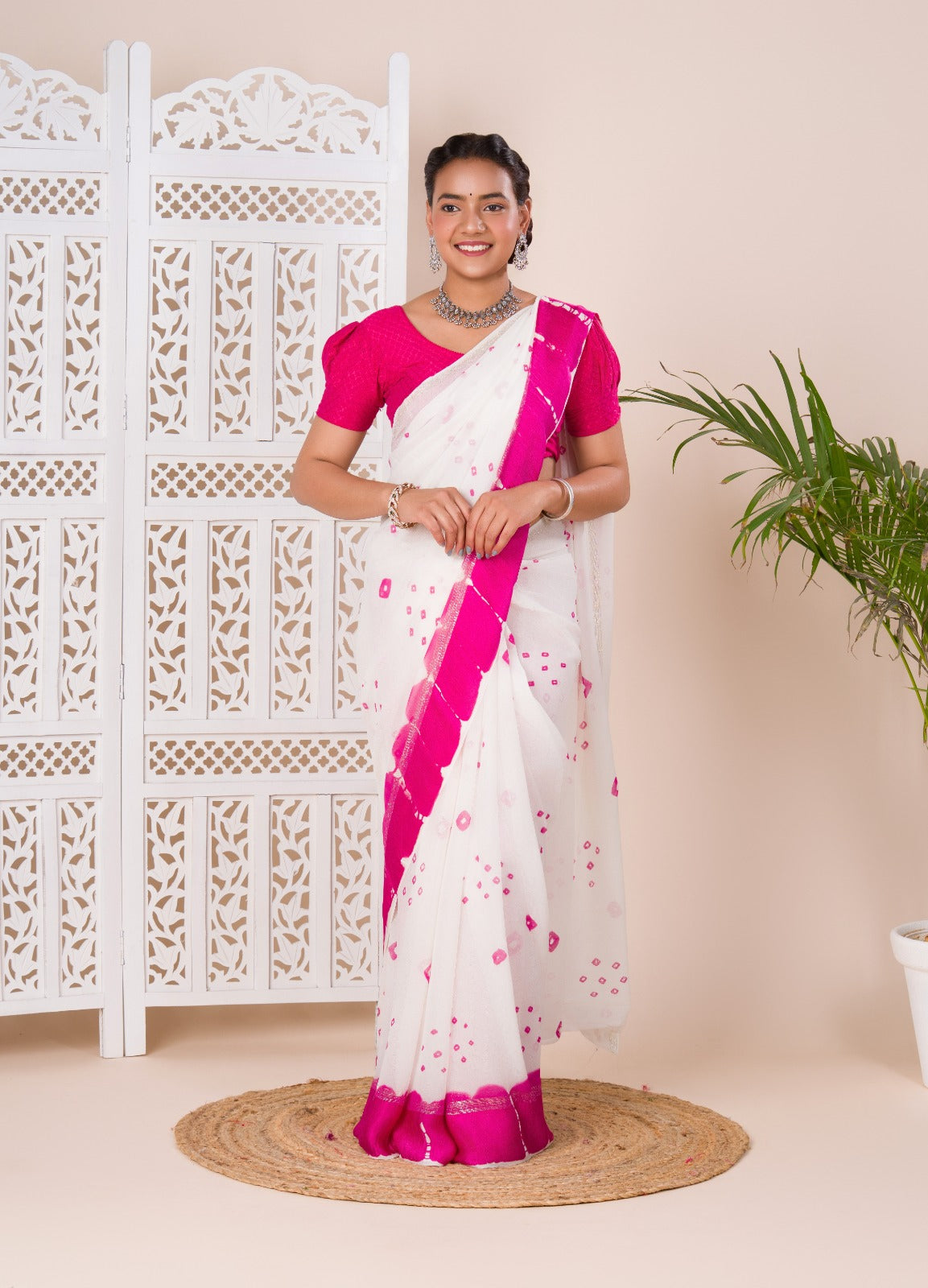 Georgette Gulti Bandhej Satin Patta Border Saree in white colour